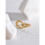 Stylish Geometric Hollow Ring - Unique Design, Stainless Steel, Waterproof Golden Fashion, 2023 Charm Jewelry for Women