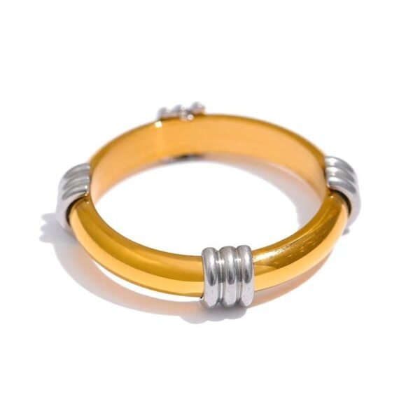 Radiant Elegance - Stainless Steel Round Ring for Women with Statement Golden Texture, a Finger Ring that is Waterproof and Fashionable